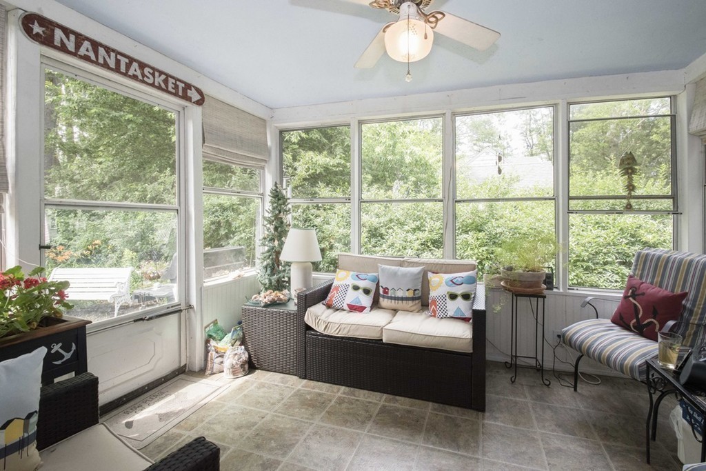 7 Jackson Road Scituate, MA 02066 - Photo 19 of 24 a living room with furniture and a large window