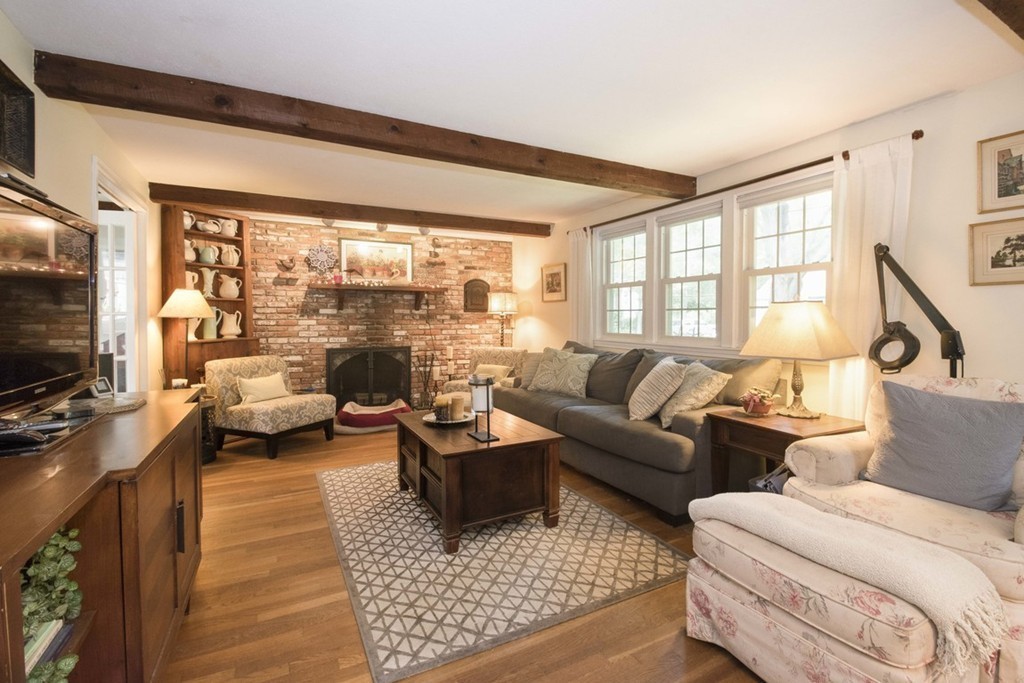 7 Jackson Road Scituate, MA 02066 - Photo 6 of 24 a living room with furniture large window and a flat screen tv