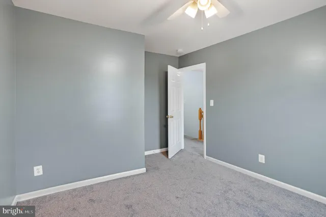 an empty room with a bathroom