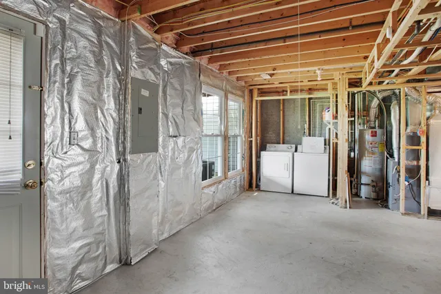 a view of a room with wooden walls