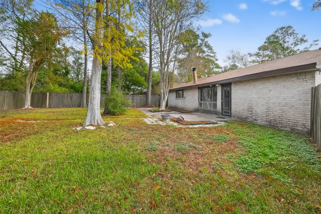 a house with swimming pool in front of it