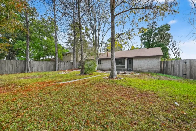 a house with trees in front of it