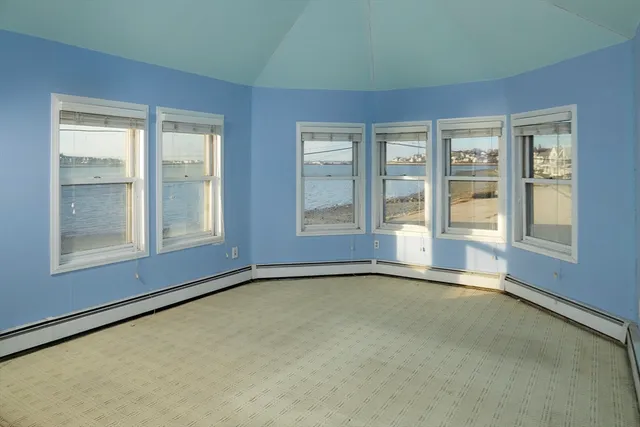 an empty room with windows