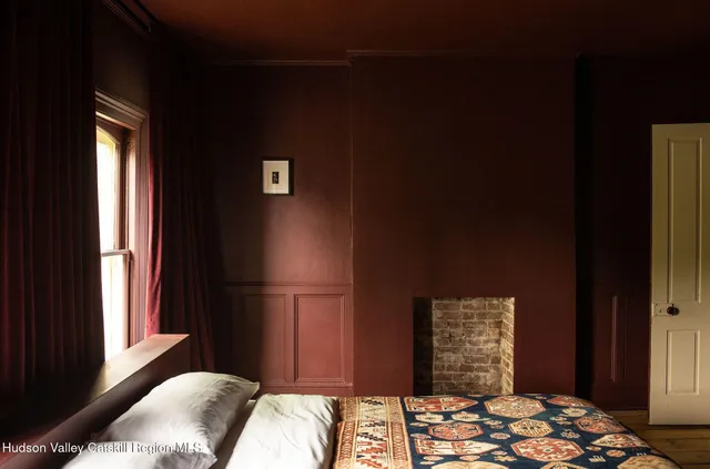 a picture of a bathroom with a shower