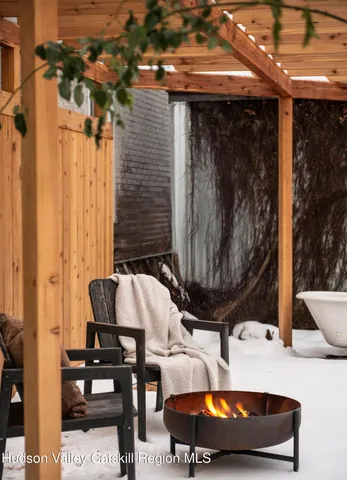 a view of a bench in a backyard