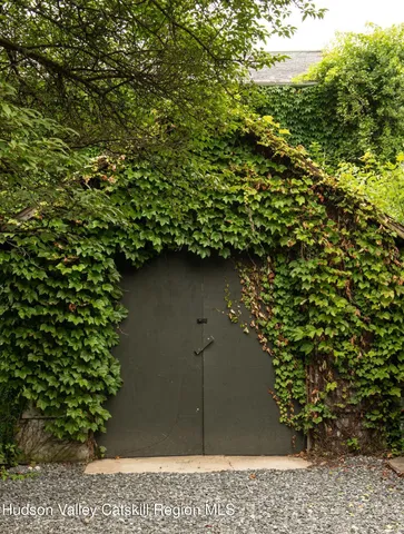 a front view of a house with yard