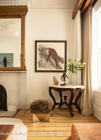 a living room with furniture and a window