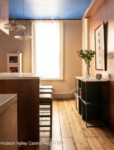 a bathroom with a sink a mirror and a bathtub