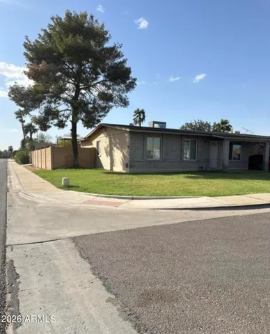 a view of a swimming pool with an outdoor space and seating area