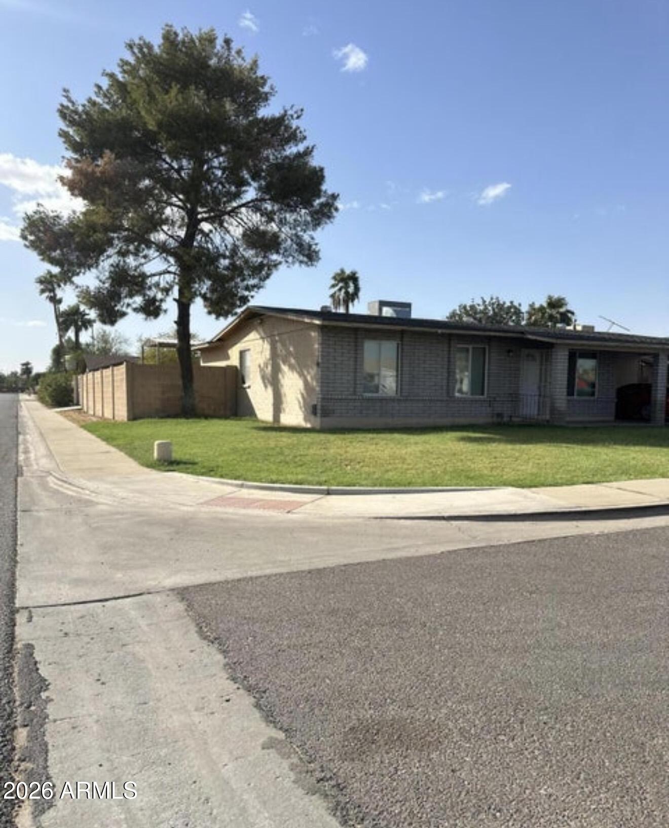 a view of a swimming pool with an outdoor space and seating area
