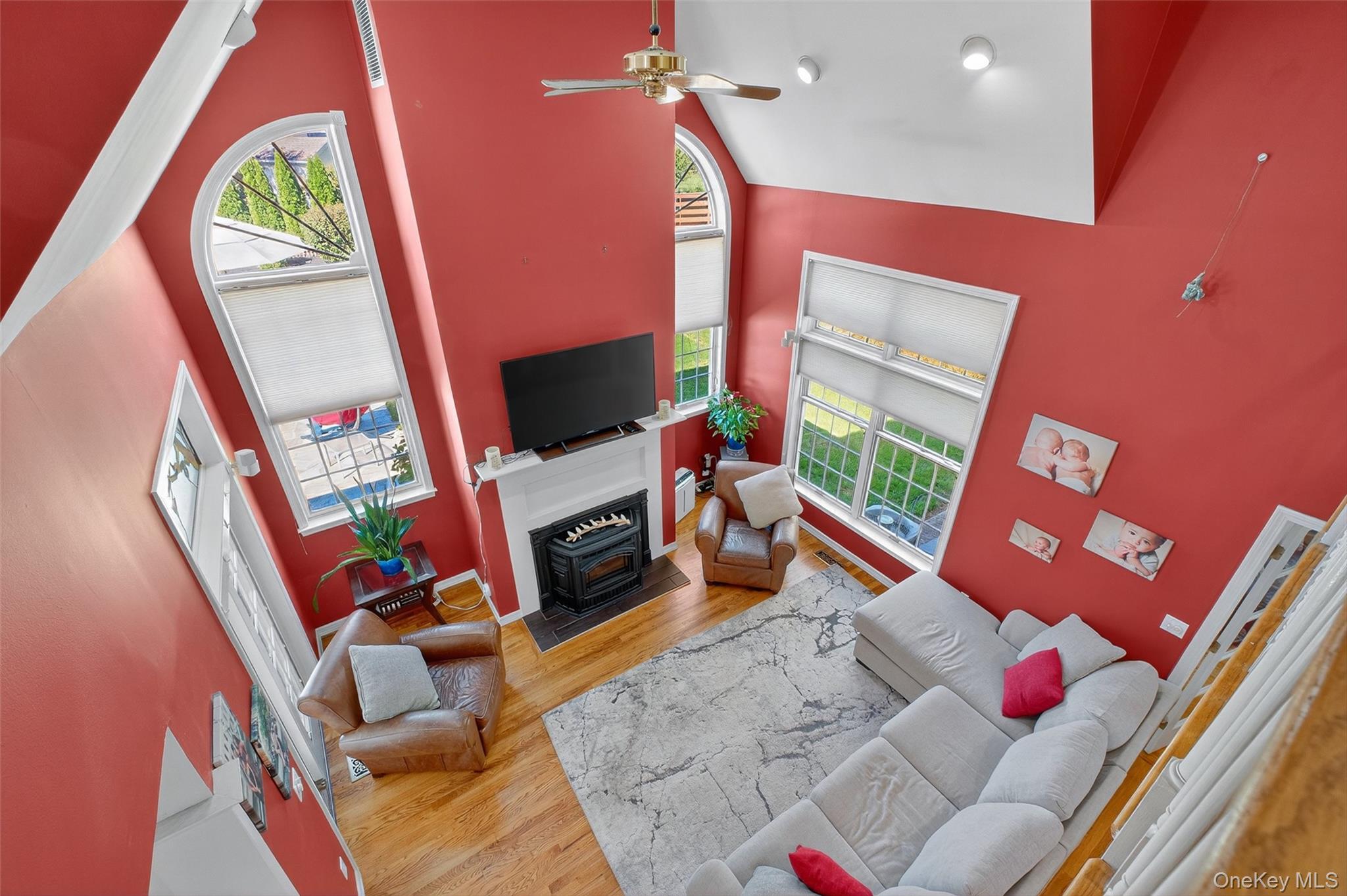8 Cale Road Amawalk, NY 10501 - Photo 17 of 47 a living room with furniture a rug and a fireplace