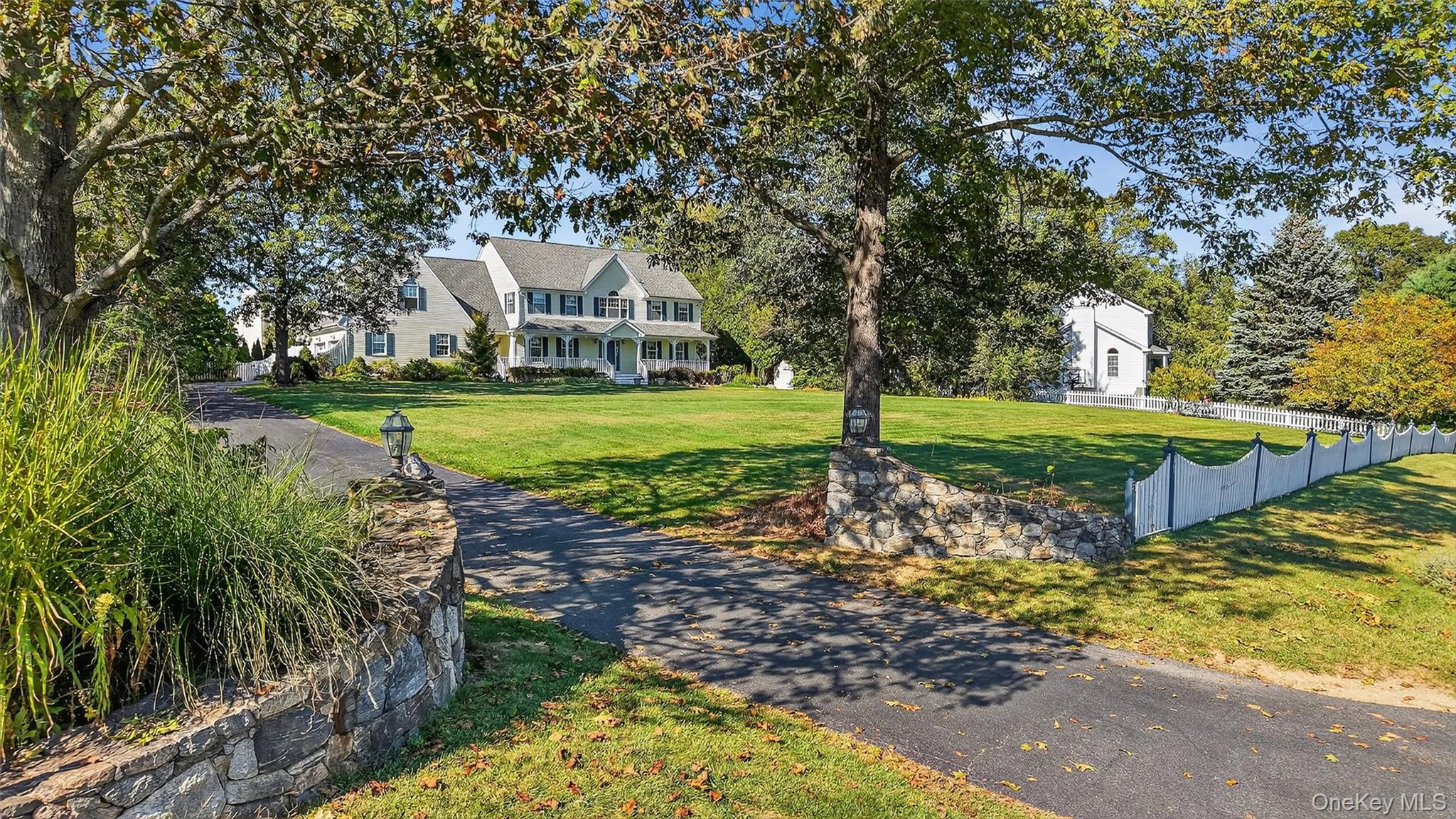 8 Cale Road Amawalk, NY 10501 - Photo 2 of 47 a view of a house with a yard and sitting area