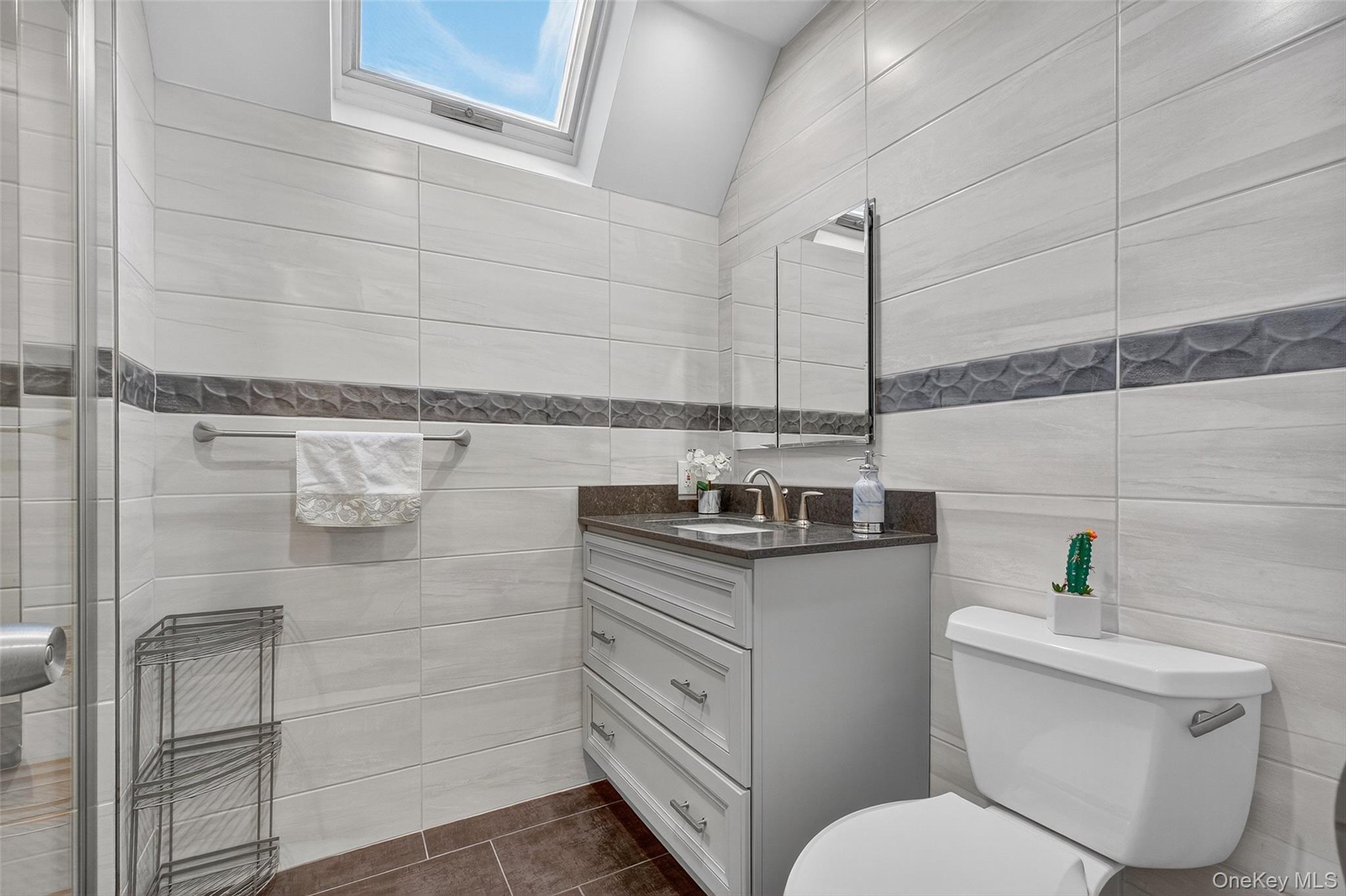 8 Cale Road Amawalk, NY 10501 - Photo 23 of 47 a bathroom with a sink a toilet and shower