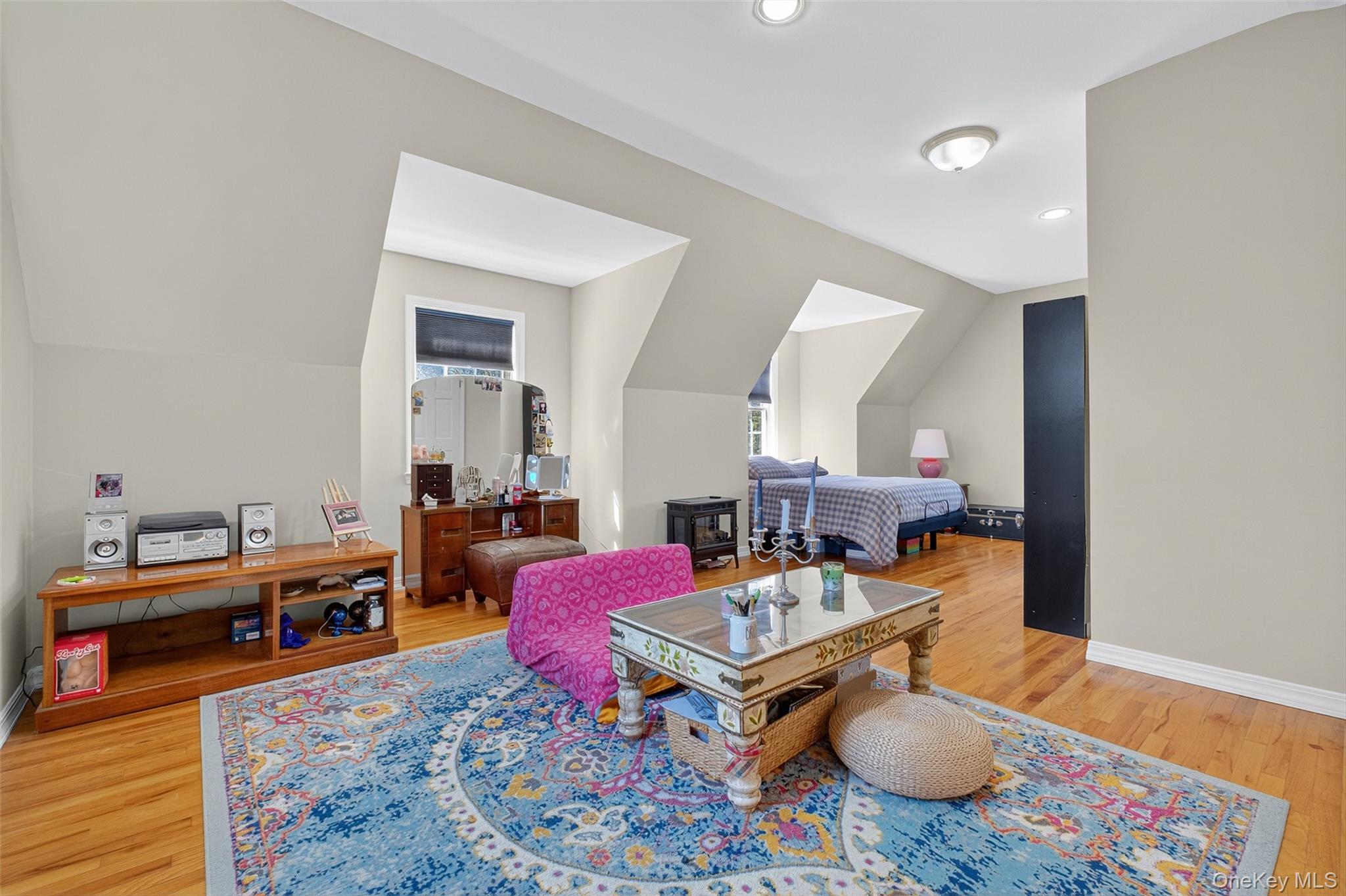 8 Cale Road Amawalk, NY 10501 - Photo 25 of 47 a living room with furniture and a wooden floor