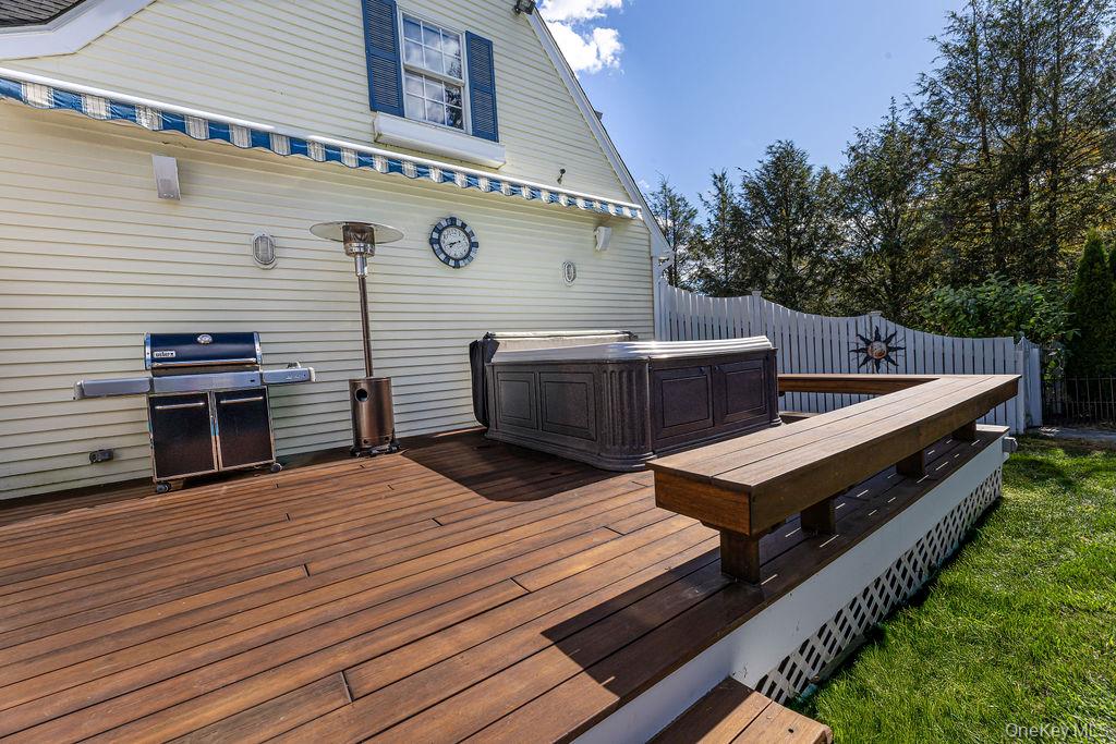 8 Cale Road Amawalk, NY 10501 - Photo 35 of 47 a view of a roof deck with wooden floor and seating space