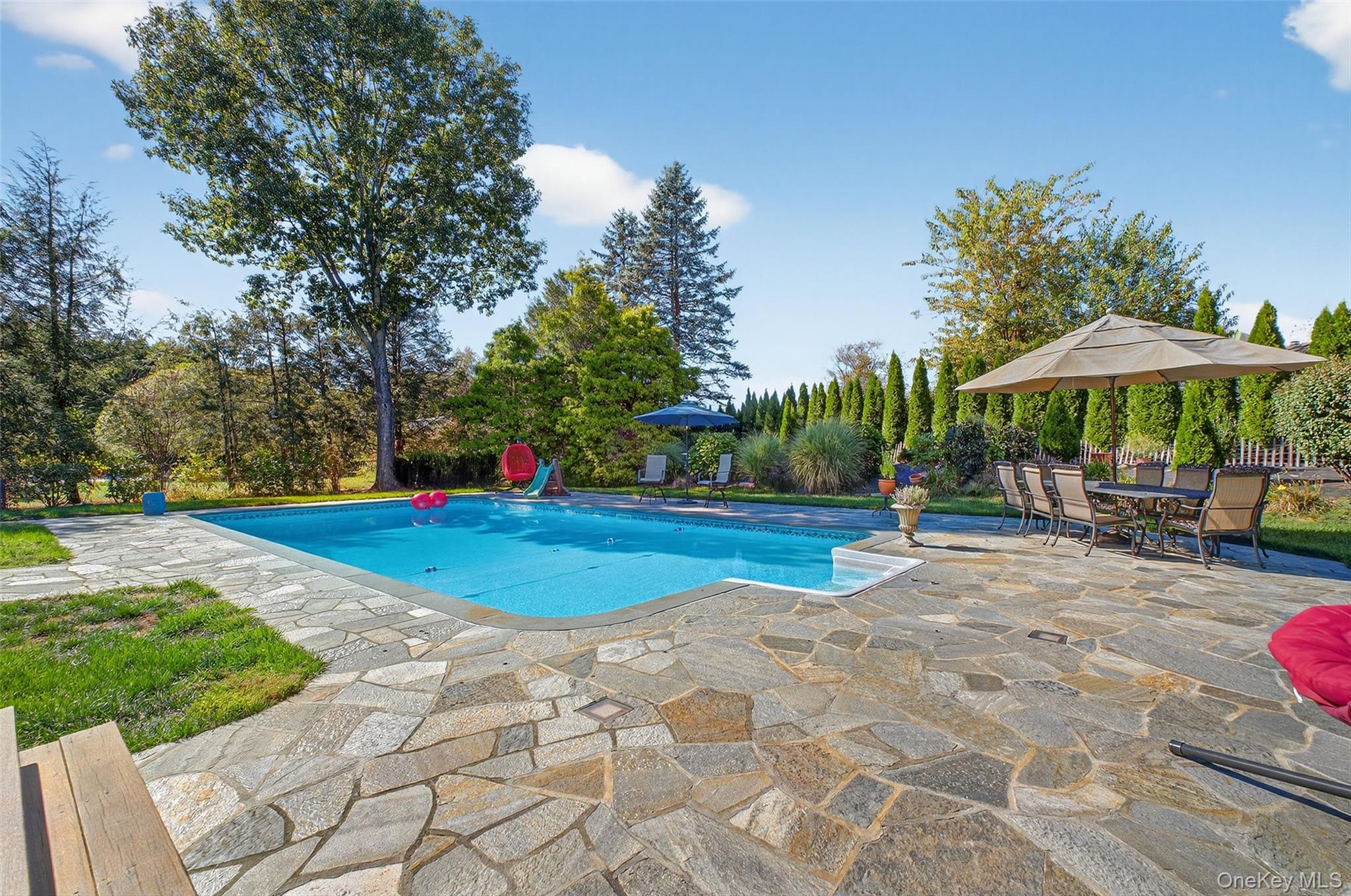8 Cale Road Amawalk, NY 10501 - Photo 37 of 47 a view of outdoor space with playground and green space