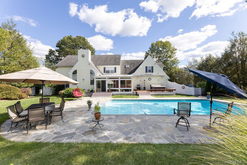 8 Cale Road Amawalk, NY 10501 - Photo 42 of 47 a view of house with backyard outdoor seating and entertaining space