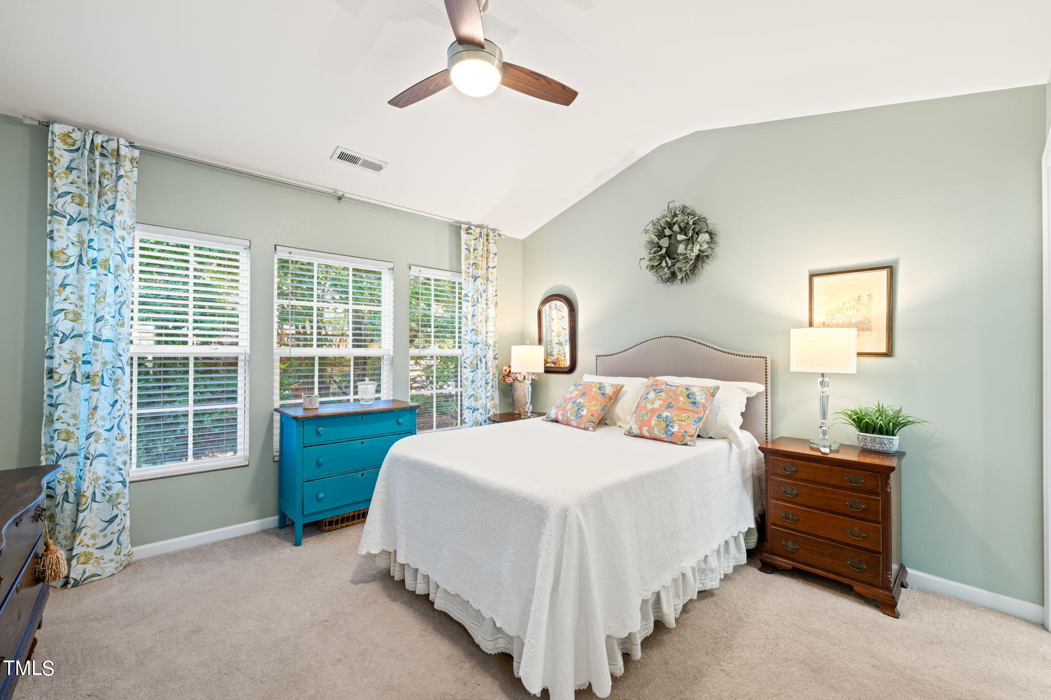 1708 Sorrell Brook Way Raleigh, NC 27609 - Photo 13 of 36 a bedroom with a bed and a large window