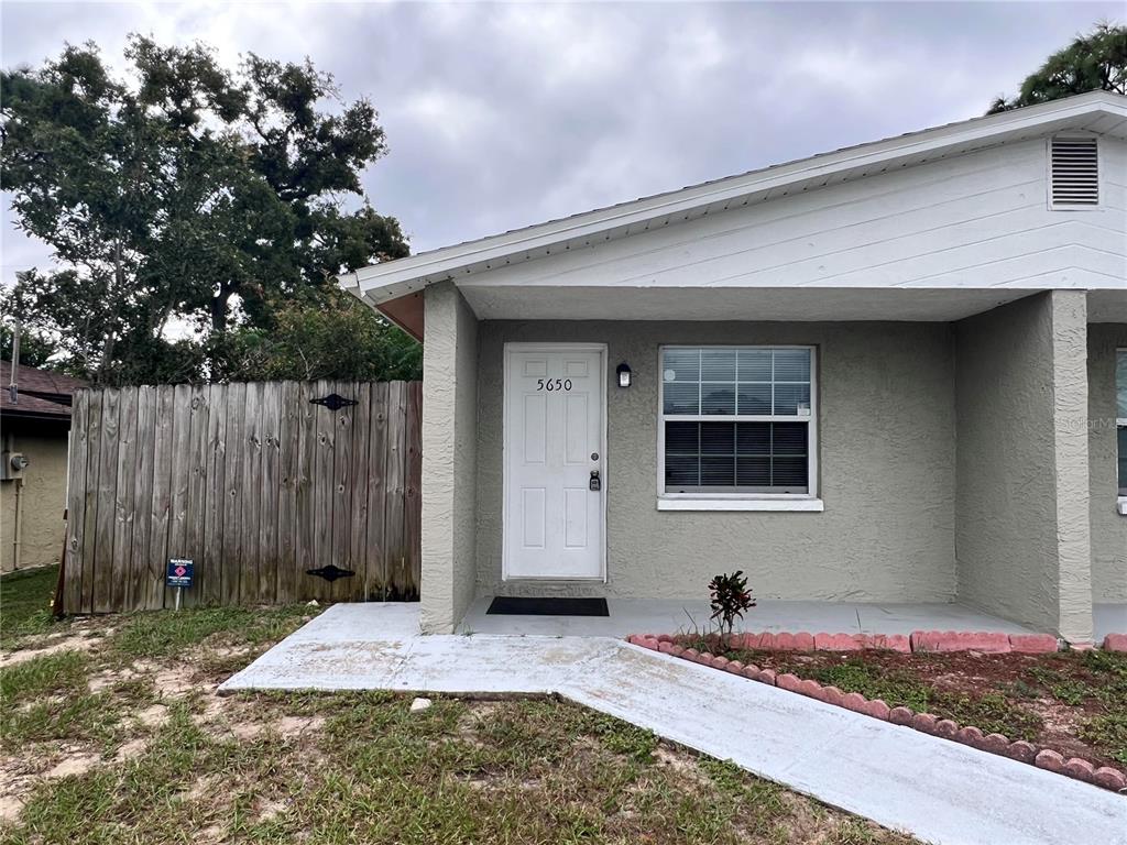 5650 Golden Nugget Drive Holiday, FL 34690 - Photo 1 of 9 a front view of a house