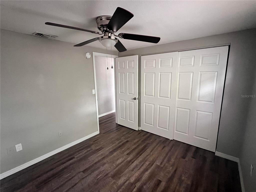 5650 Golden Nugget Drive Holiday, FL 34690 - Photo 9 of 9 a view of empty room with wooden floor
