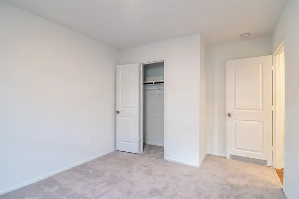 an empty room with closet