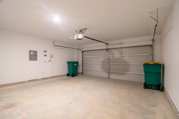 a view of an empty room with a fireplace