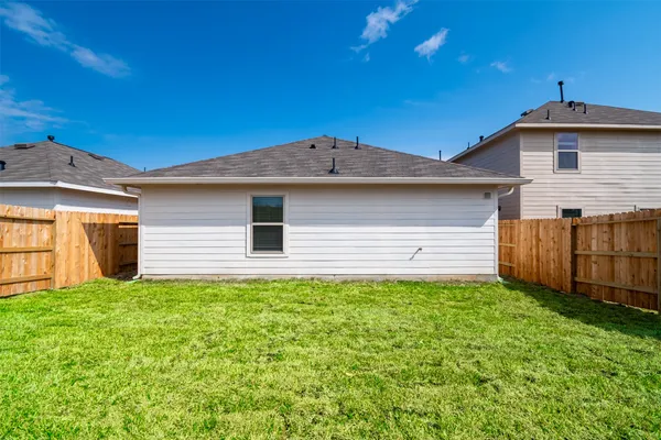 a front view of a house with yard