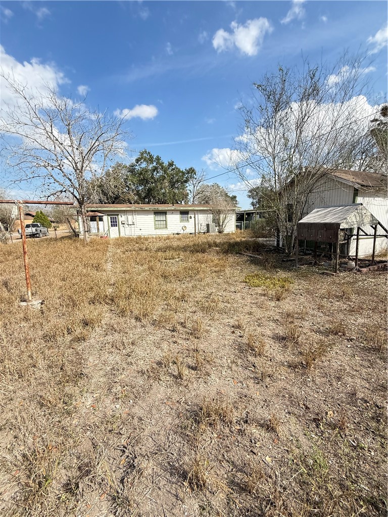 1603 Pena Street Alice, TX 78332 - Photo 14 of 15 a view of a yard with wooden fence