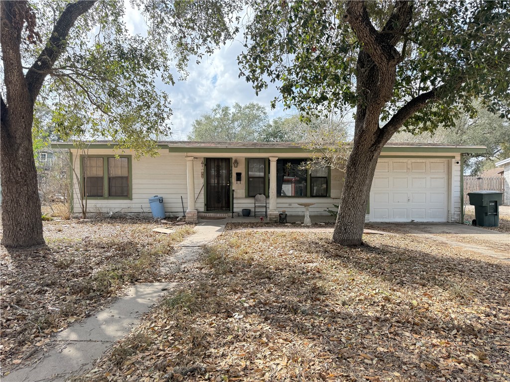 1603 Pena Street Alice, TX 78332 - Photo 2 of 15 a view of a house with a yard and large tree