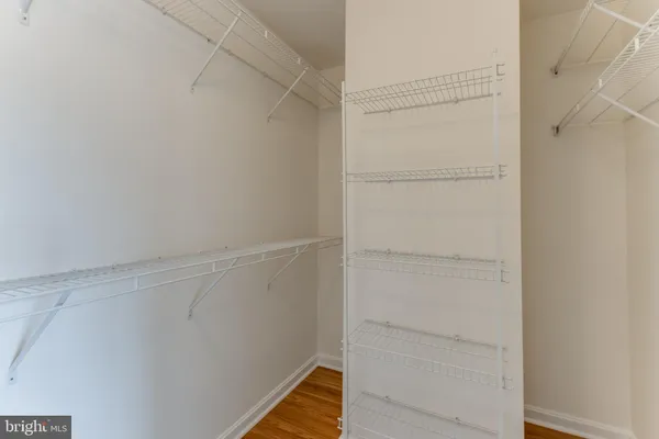 a view of an empty walk in closet