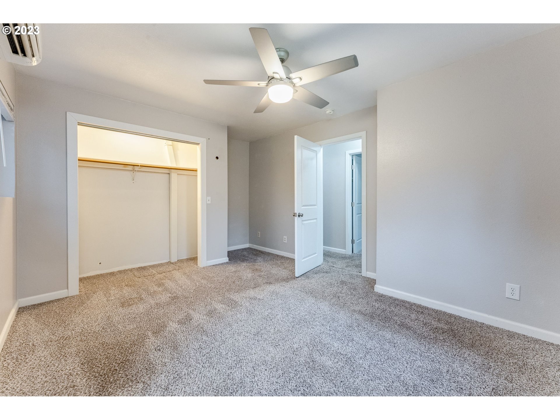24505 Northeast Dresser Road Camas, WA 98607 - Photo 21 of 34 a view of an empty room with a ceiling fan