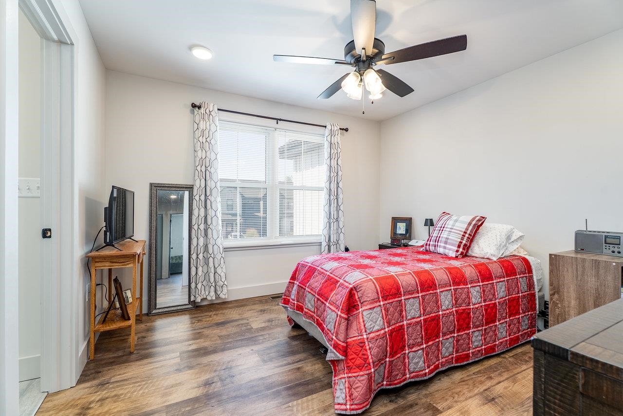 30 Field Court Bridgewater, VA 22812 - Photo 39 of 65 a bedroom with a bed and wooden floor