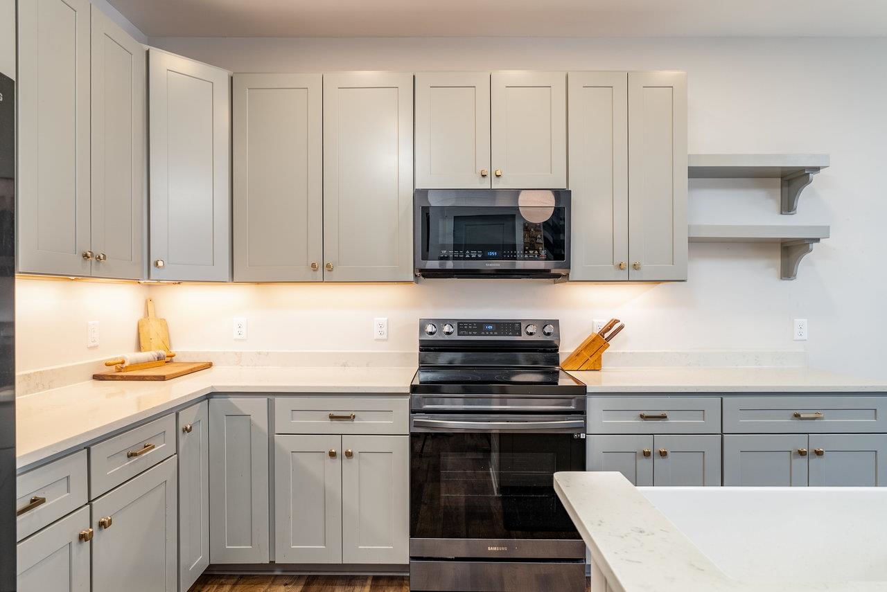 30 Field Court Bridgewater, VA 22812 - Photo 8 of 65 a kitchen with cabinets stainless steel appliances and a counter space