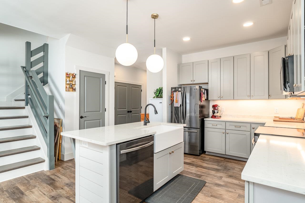 30 Field Court Bridgewater, VA 22812 - Photo 10 of 65 a kitchen that has a lot of cabinets a island and stainless steel appliances