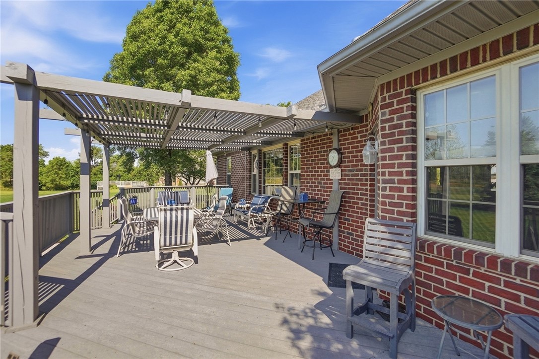 710 Governors Road Troy, OH 45373 - Photo 47 of 56 An inviting outdoor living space features a spacious deck and an open pergola.