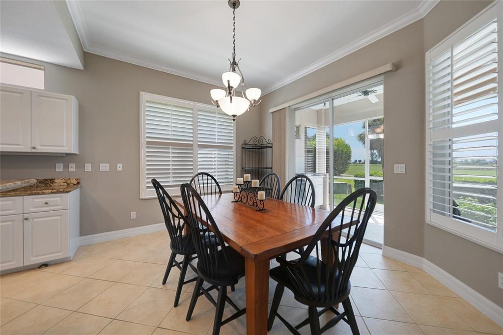 3959 San Rocco Court, Unit 911 Punta Gorda, FL 33950 - Photo 57 of 85 a view of a dining room with furniture window and outside view