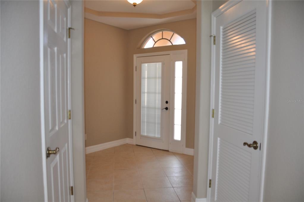 3959 San Rocco Court, Unit 911 Punta Gorda, FL 33950 - Photo 7 of 85 a view of empty room with front door