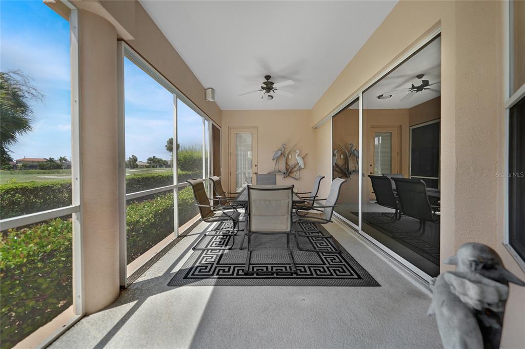3959 San Rocco Court, Unit 911 Punta Gorda, FL 33950 - Photo 75 of 85 a dining room with a table and chairs