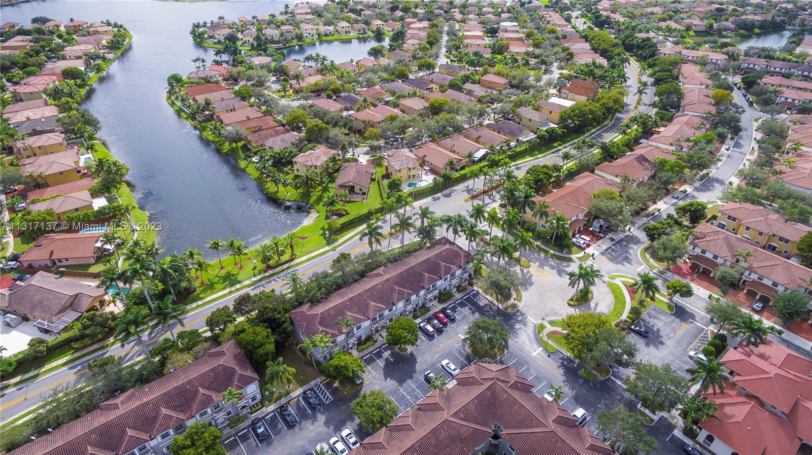 4971 Southwest 140th Terrace, Unit 6 Miramar, FL 33027 - Photo 22 of 24 an aerial view of residential houses with outdoor space
