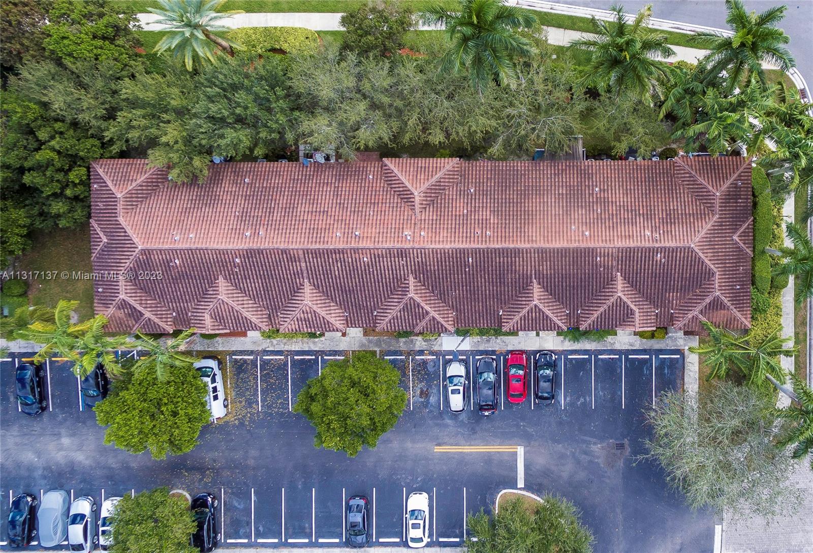 4971 Southwest 140th Terrace, Unit 6 Miramar, FL 33027 - Photo 23 of 24 an aerial view of multiple house