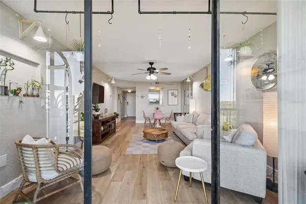 a bedroom with furniture and a window