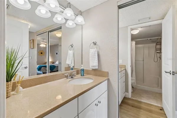 an outdoor space with swimming pool and furniture