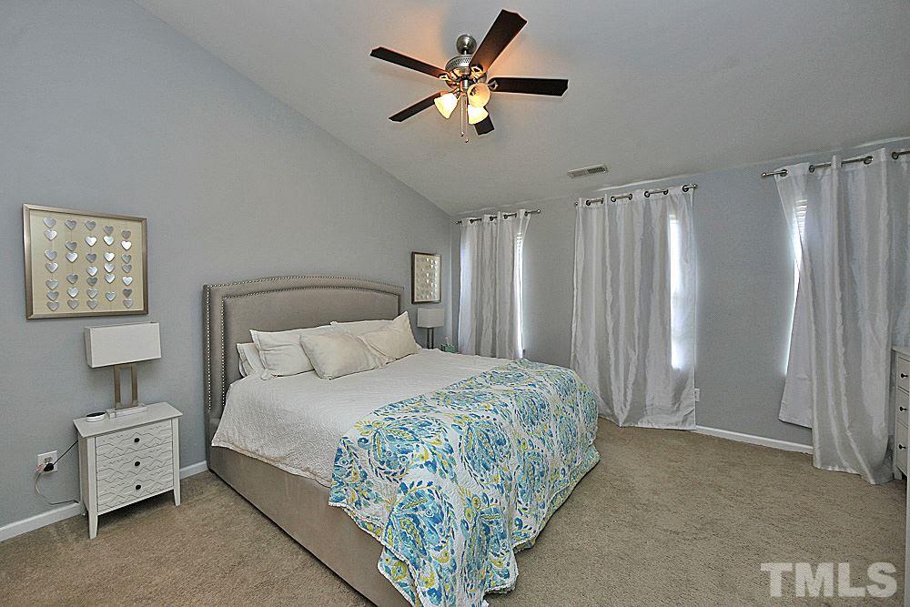 4532 Sugarbend Way Raleigh, NC 27606 - Photo 5 of 14 Spacious Master Bedroom Suite with Vaulted Ceiling and Ceiling Fan.