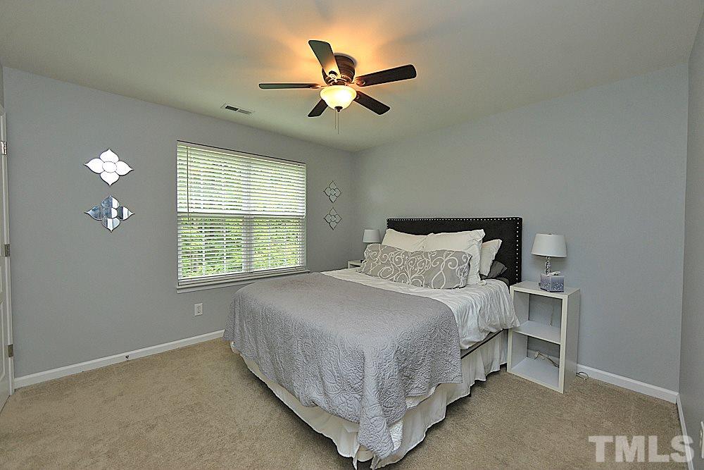 4532 Sugarbend Way Raleigh, NC 27606 - Photo 7 of 14 Complete with Ceiling Fan and View of Wooded Buffer & Backyard.