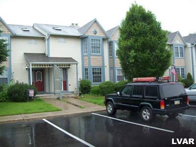 a car parked in front of a house