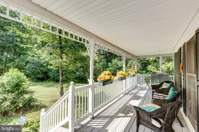 a view of balcony with furniture