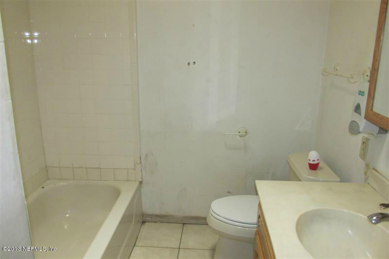 7436 Sandhurst Road South Jacksonville, FL 32277 - Photo 8 of 10 a bathroom with a sink and toilet