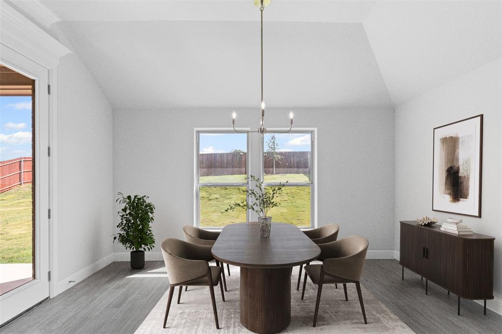 624 Jameson Springtown, TX 76082 - Photo 15 of 40 a view of a dining room with furniture window and wooden floor