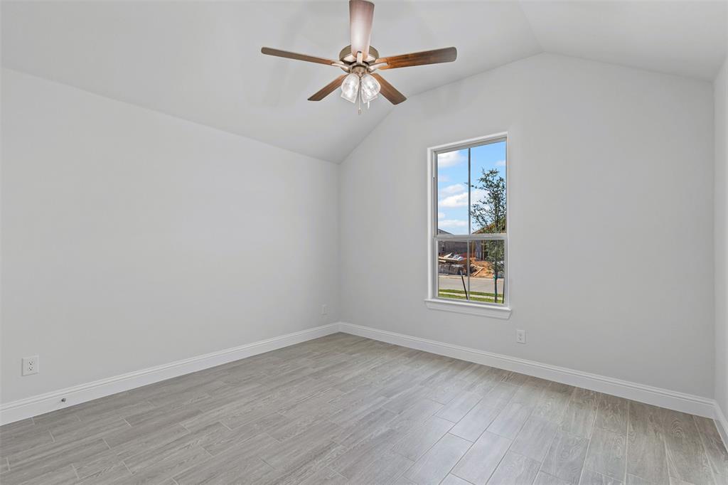 624 Jameson Springtown, TX 76082 - Photo 25 of 40 wooden floor in an empty room with a window