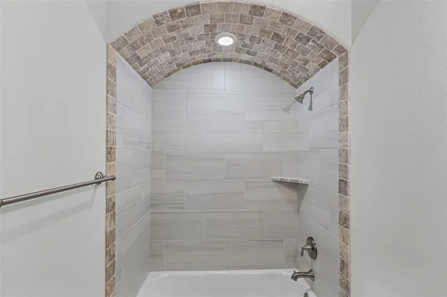 a bathroom with a sink and a shower